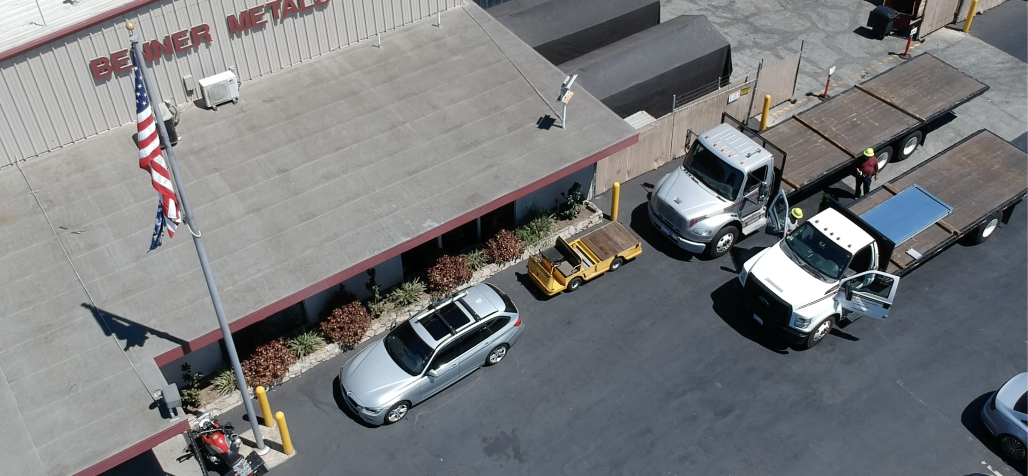 Benner Metals facility and delivery trucks in Fullerton